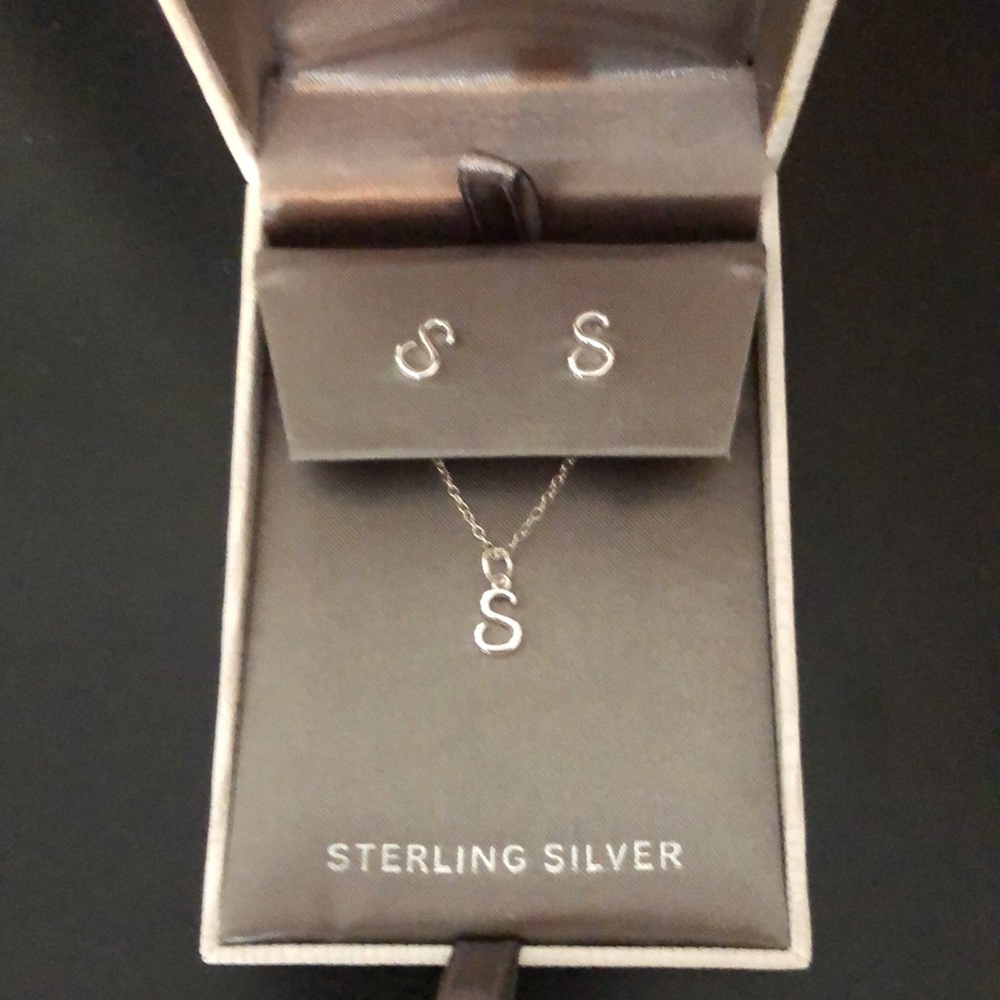 NWT sterling silver necklace and earring set.